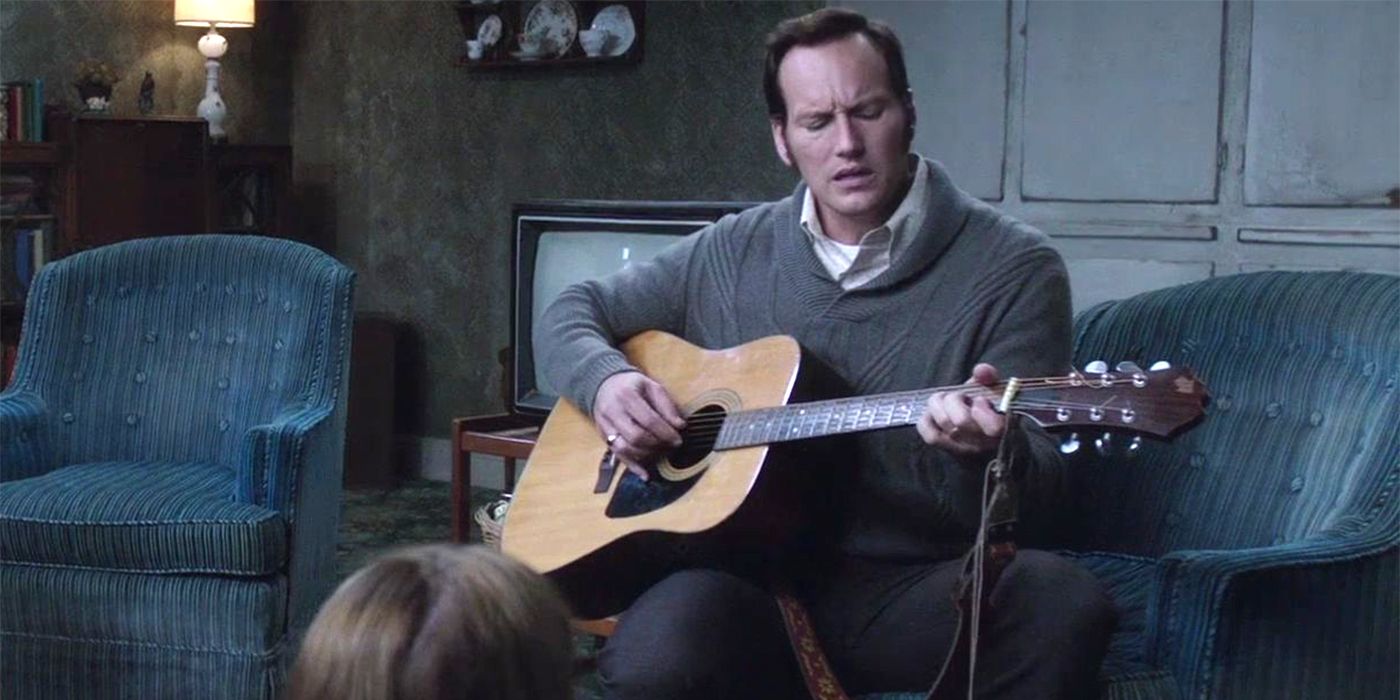Patrick Wilson playing a guitar in The Conjuring 2