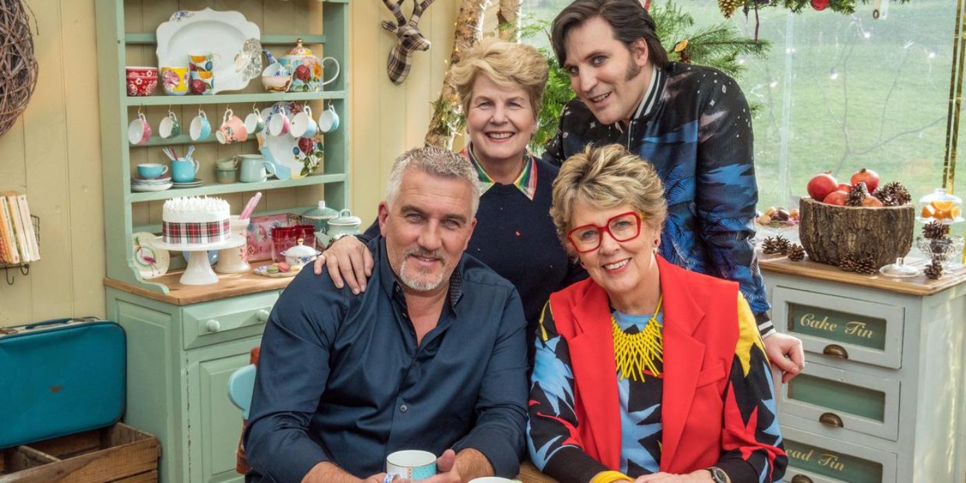 Paul, Prue, and the two hosts in Bake Off