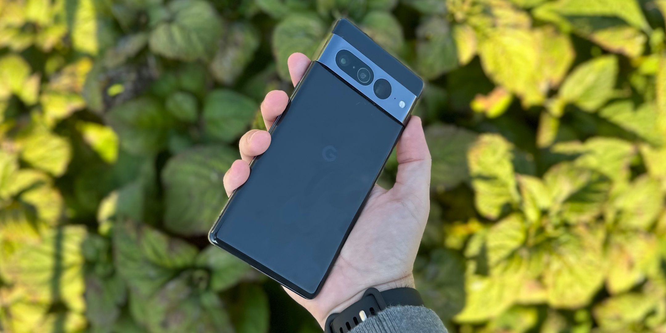 Photo of the Pixel 7 Pro in hand showing the back of the phone
