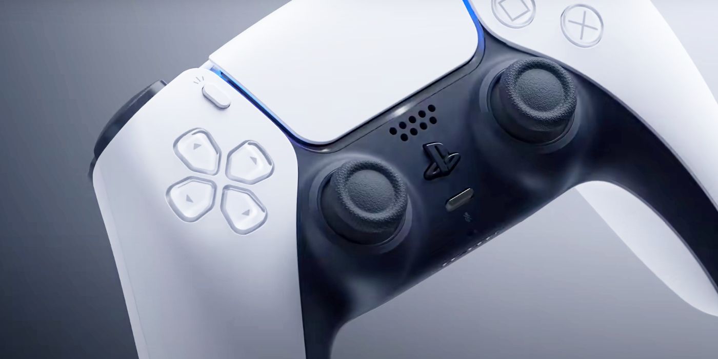 Imagem do controle DualSense do PlayStation 5.  Esta versão apresenta o acabamento original em branco e preto.