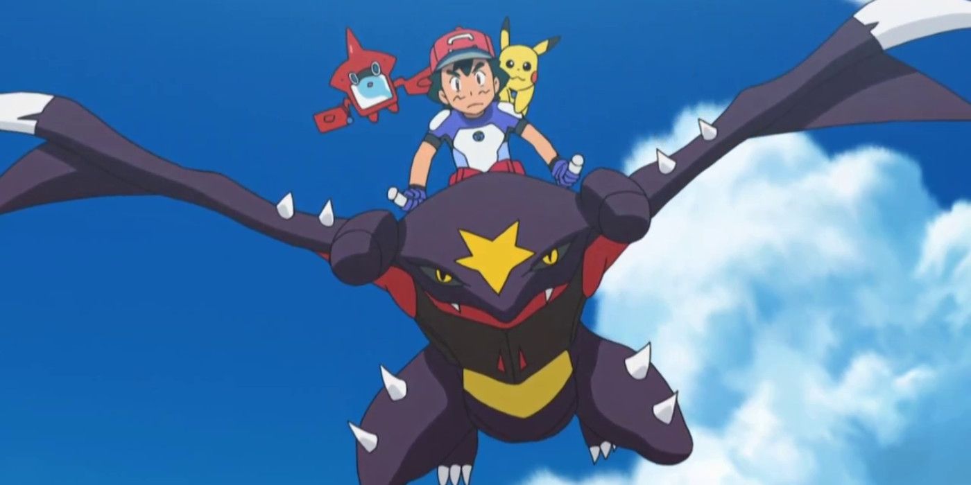Ash riding Garchomp in the Pokemon anime