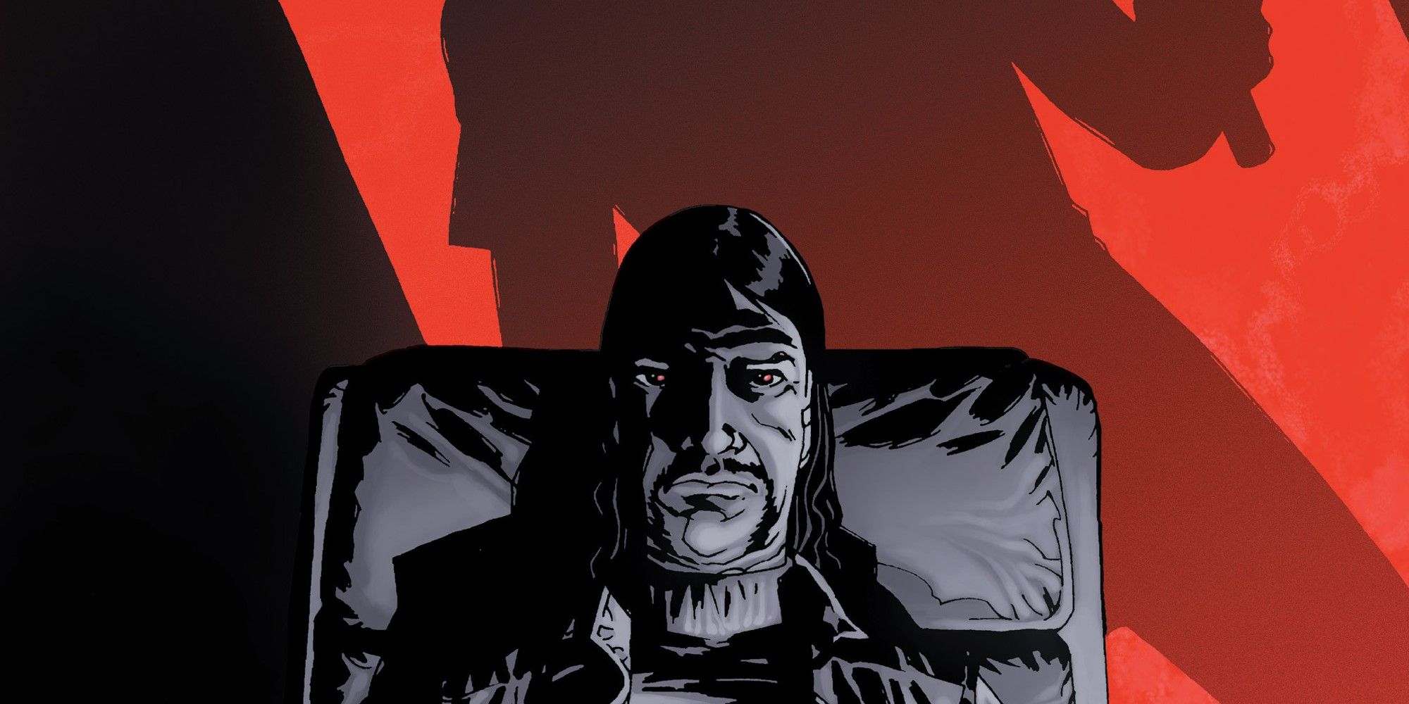 The Walking Dead Deluxe #33, the Governor sitting in a leather chair, with reddish eyes, against a red backdrop.