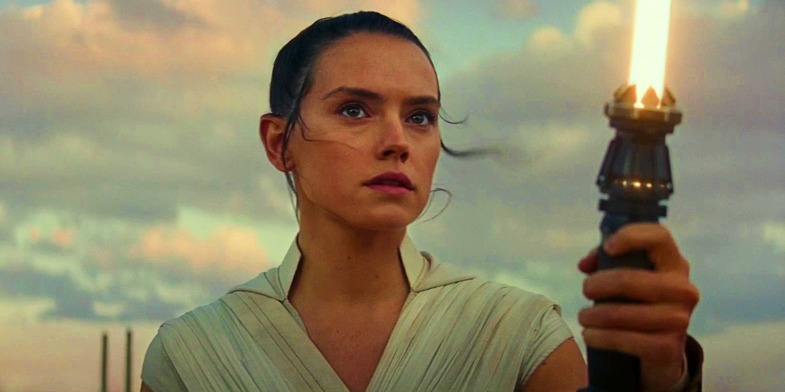 Rey at the end of Star Wars: The Rise of Skywalker with yellow light saber