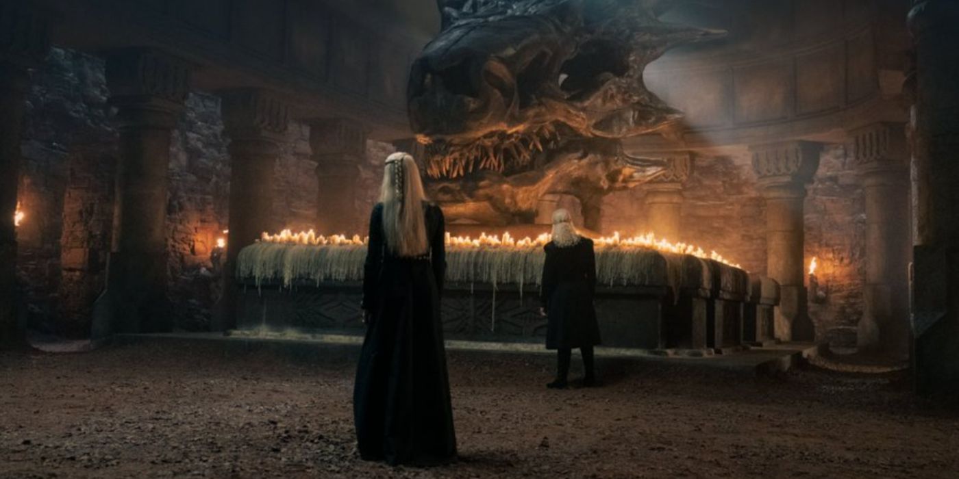 Rhaenyra and Viserys looking upon the skull of Balerion.