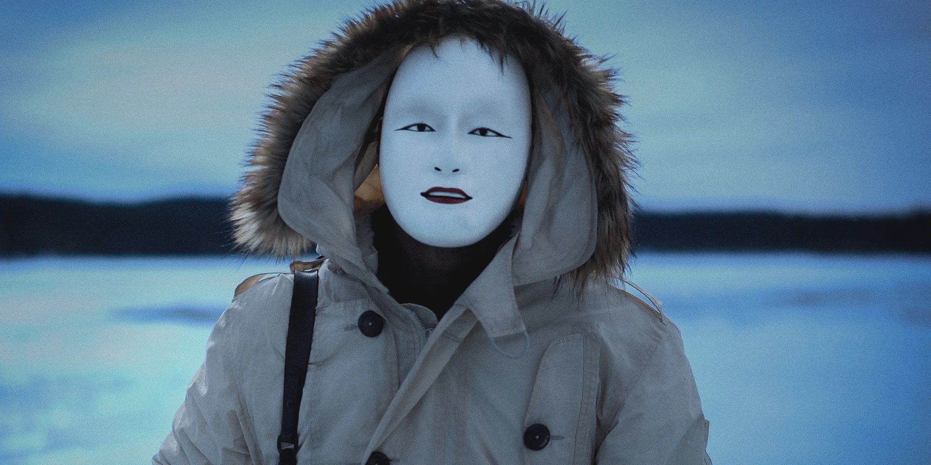 Safin wearing a creepy mask in No Time to Die