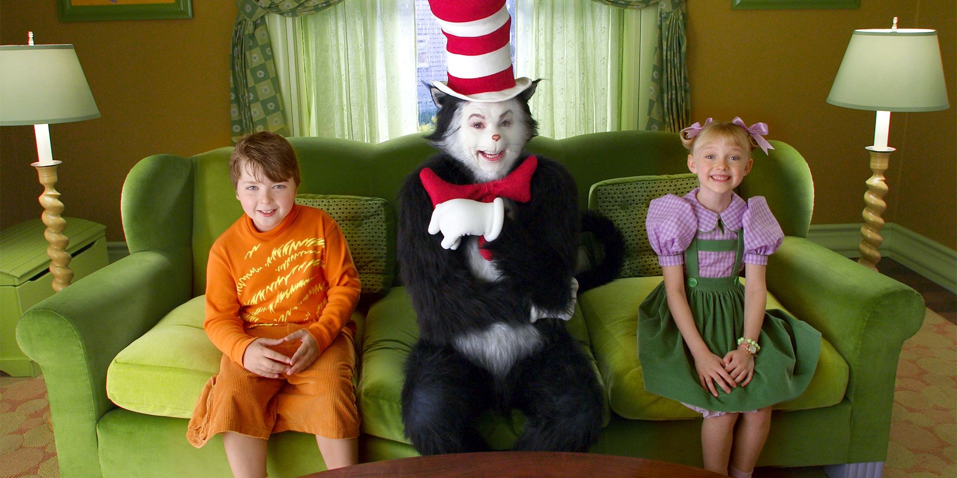 Sally and Conrad with the Cat on the couch in The Cat in the Hat