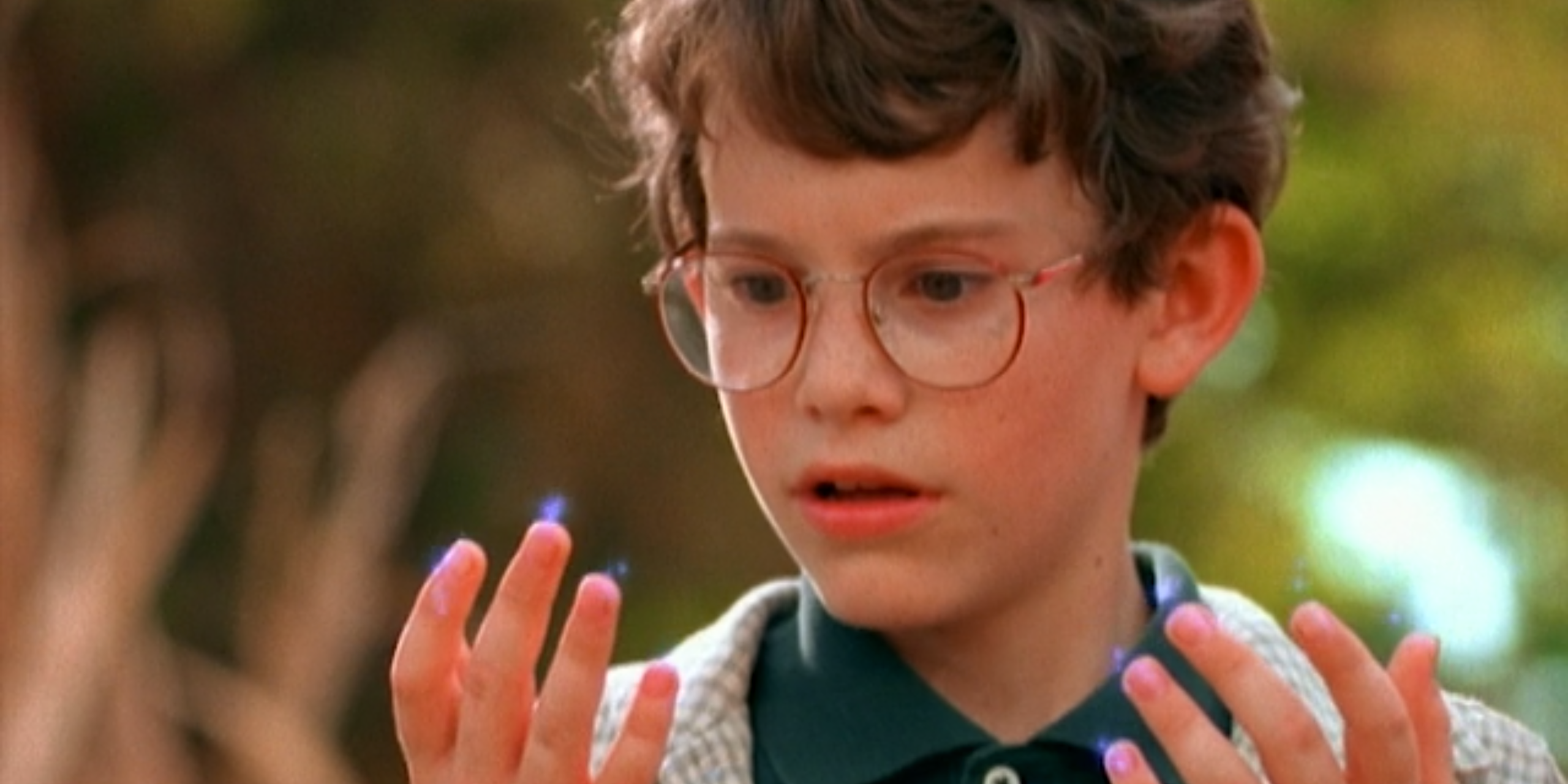 Dylan staring as sparks come from his fingers in Halloweentown