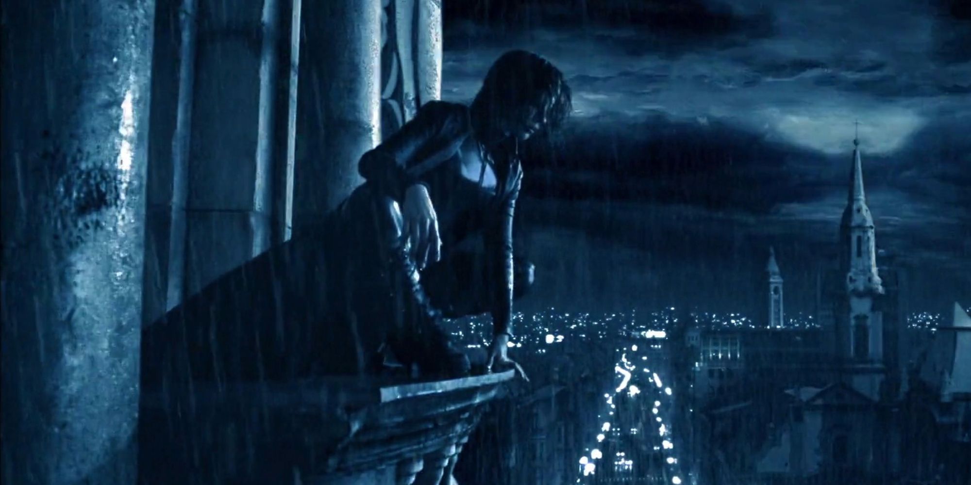 Selene brooding over the city in Underworld (2003)