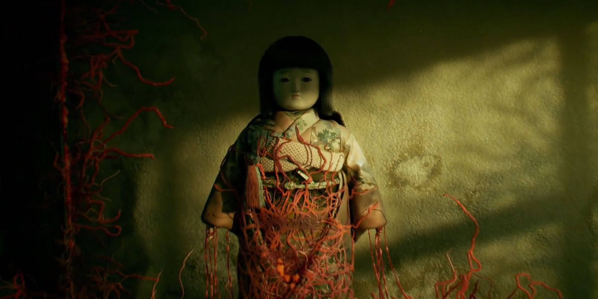 A creepy doll in Silent Hill f, with some strange growth forming on it.