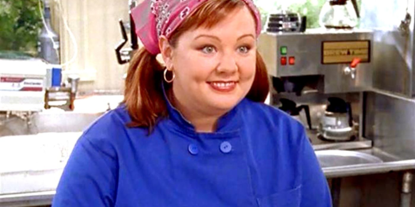 Sookie sorrindo em sua cozinha em Gilmore Girls. 