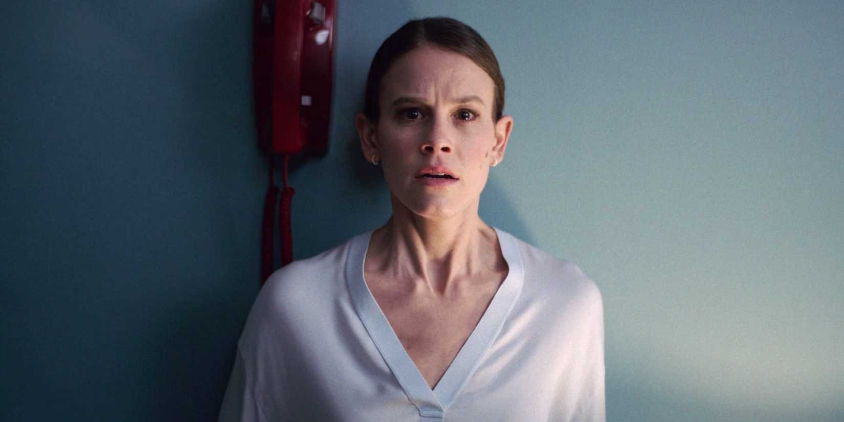 Sosie Bacon as Dr. Rose Cotter by a phone in Smile