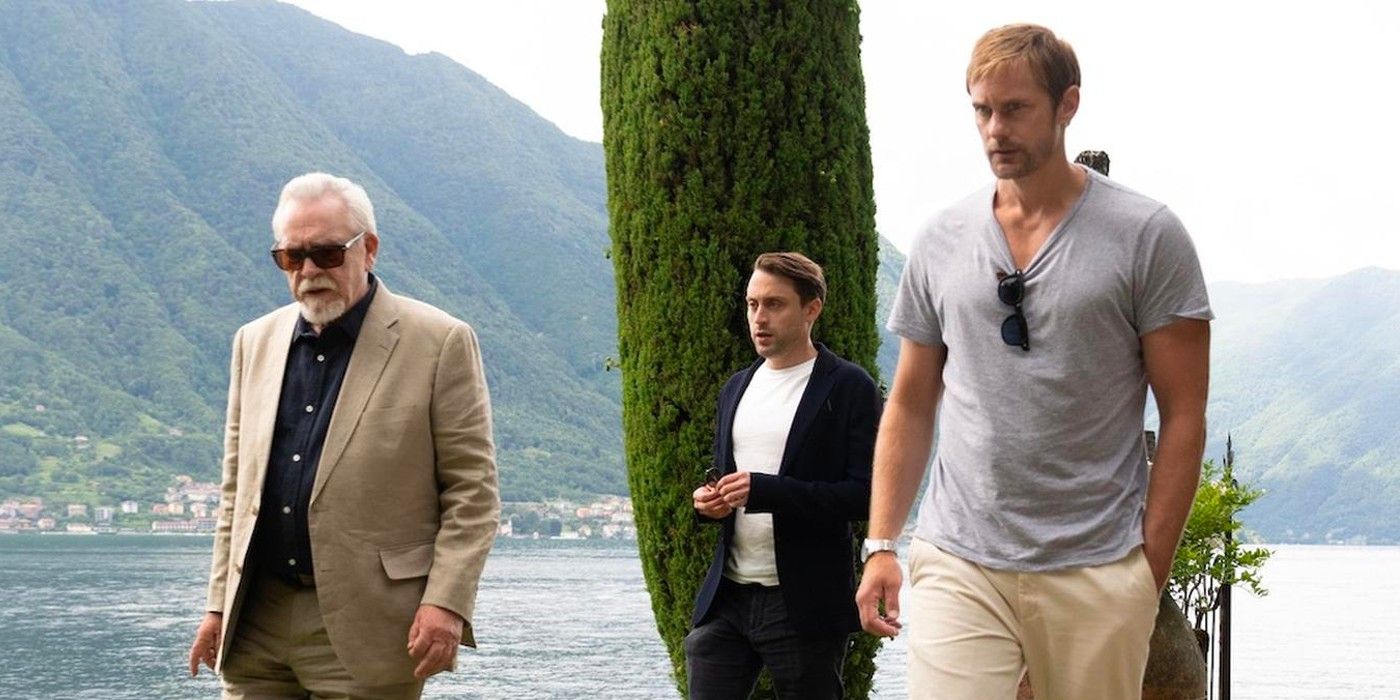 Succession Logan Roy (Brian Cox), Roman Roy (Kieran Culkin), and Lukas Matsson (Alexander Skarsgård) walk along the shore in Succession.