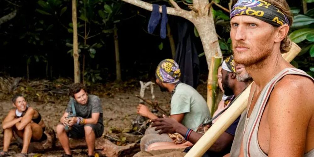 Tyson sits with his tribe on Survivor