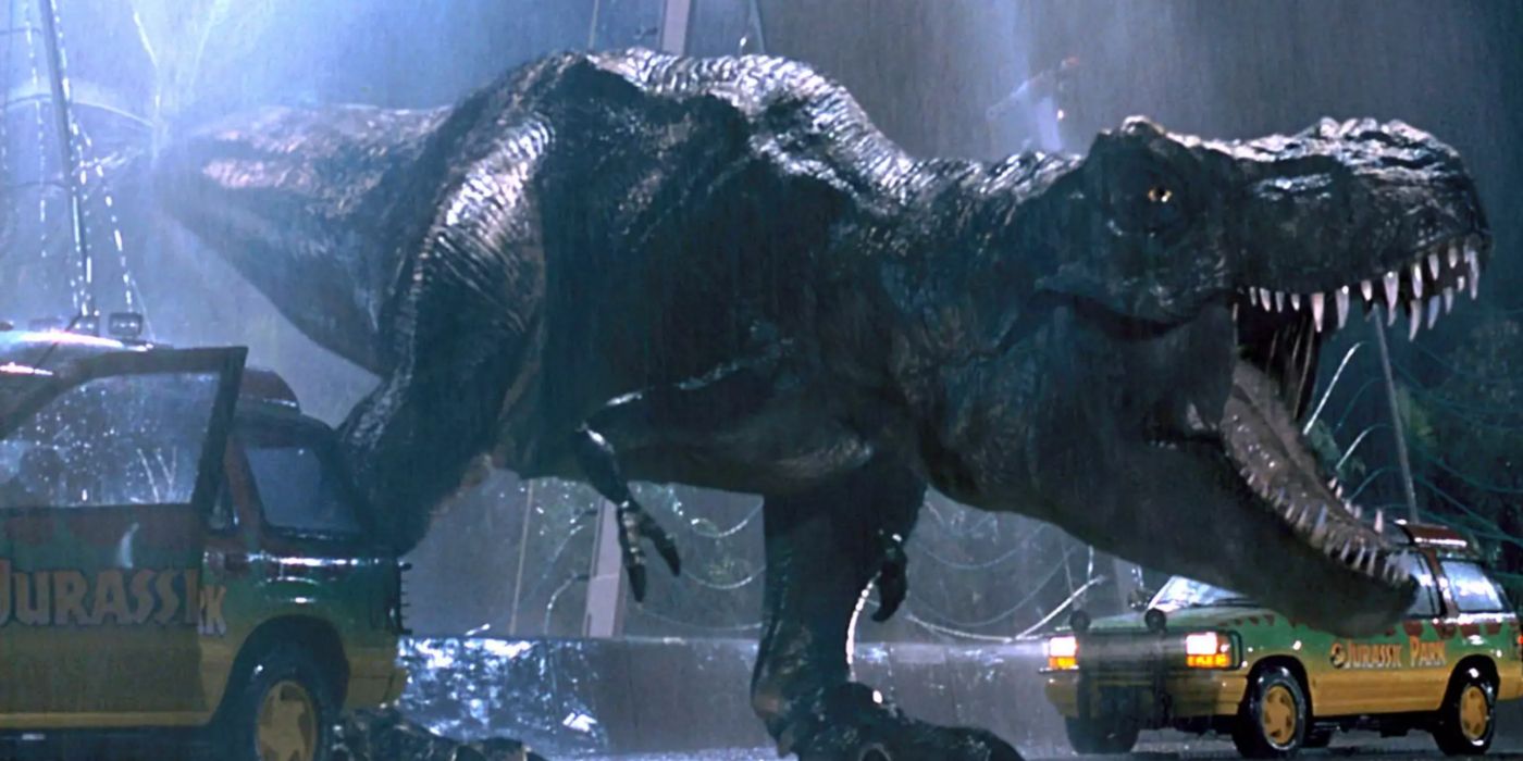 De T-Rex brult in een stortbui terwijl ze ontsnapt uit haar verblijf in Jurassic Park.