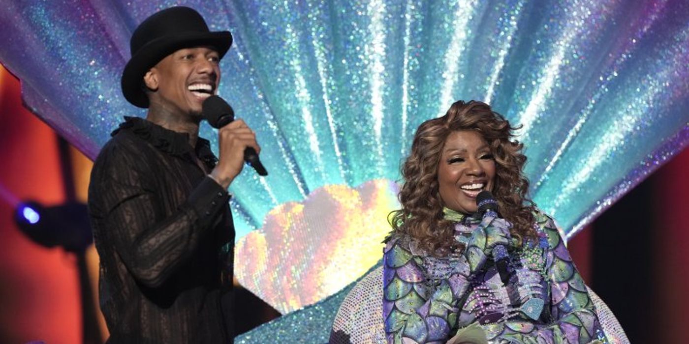 The Masked Singer host Nick Cannon and Gloria Gaynor as Mermaid during her reveal