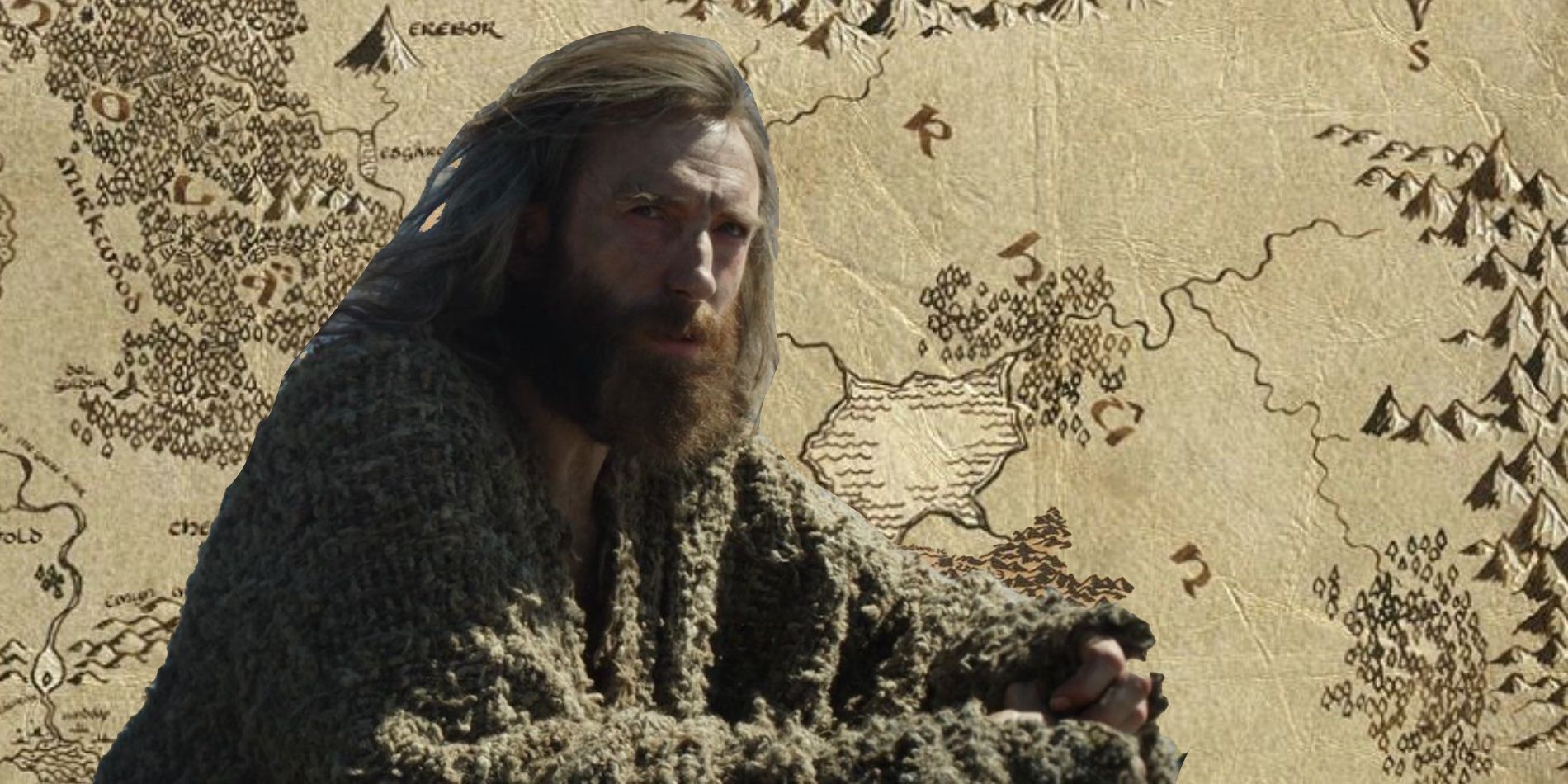 The Stranger played by Daniel Weyman in front of a map of Rhun.