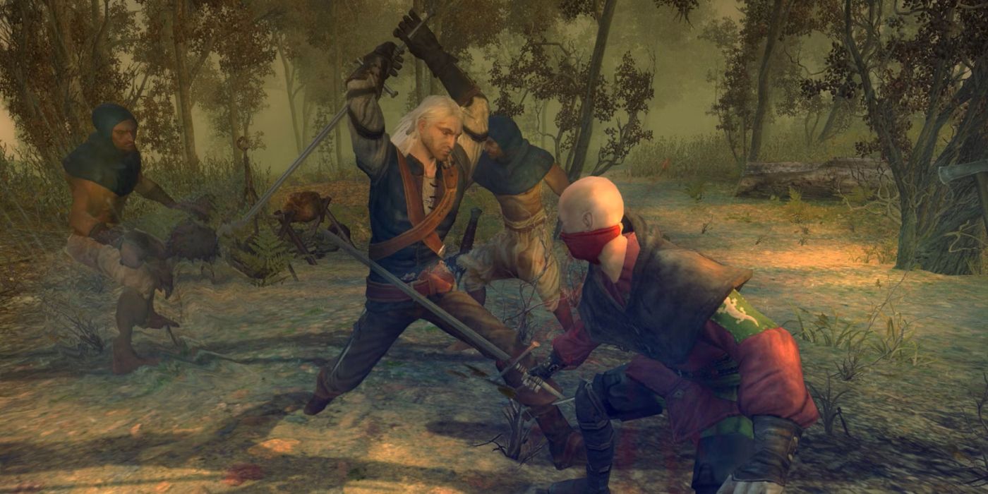 Geralt of Rivia fighting assassins in The Witcher.
