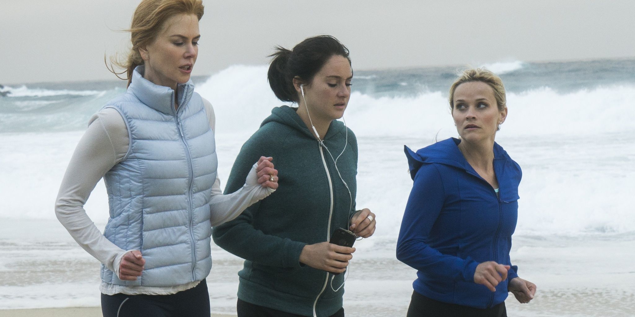 Three women jog by the beach in Big Little Lies 