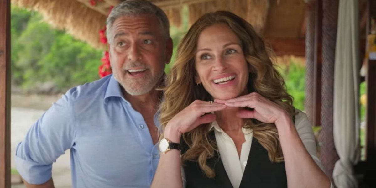George Clooney and Julia Roberts putting on fake smiles in Ticket To Paradise