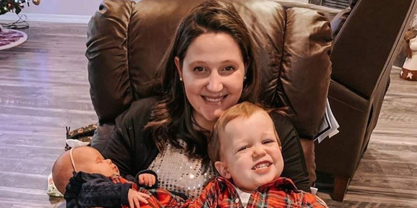 Tori Roloff from Little People Big World holds a smiling baby.