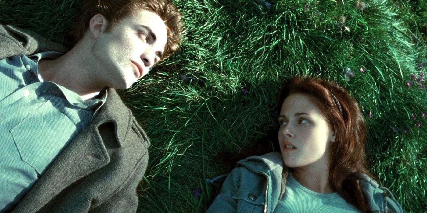 Edward sparkling lying down with Bella in a field in Twilight
