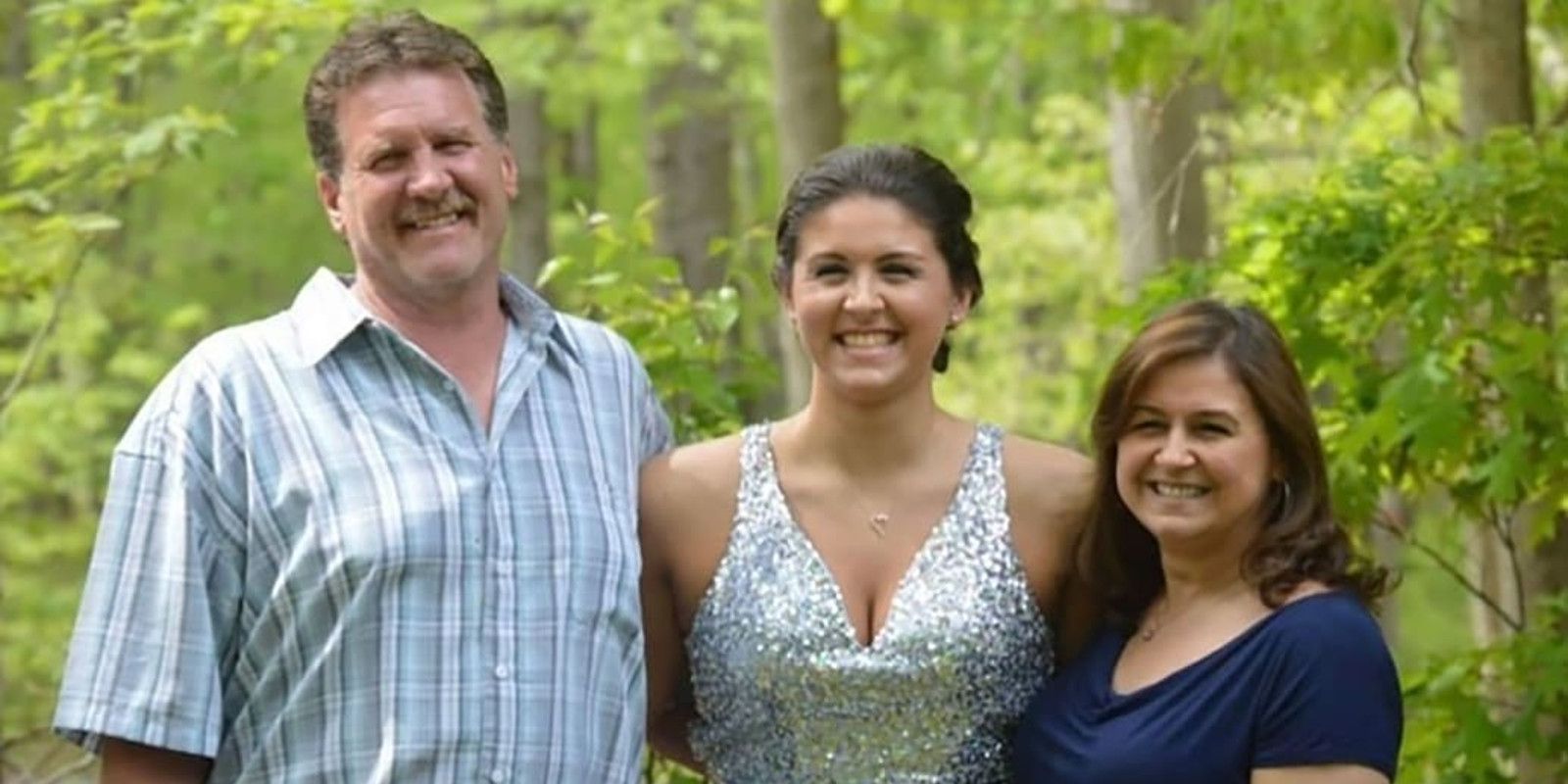 Tiffany Valiante and Parents smiling in a woods in Unsolved Mysteries
