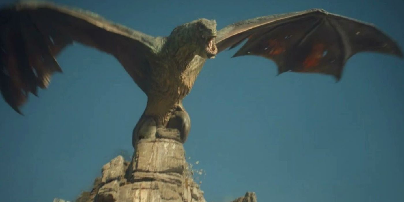 Vhagar spreading her wings while standing on a cliff in House of the Dragon.