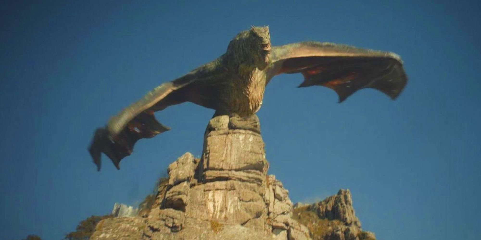 Vhagar abrindo suas asas e rugindo na Casa do Dragão.