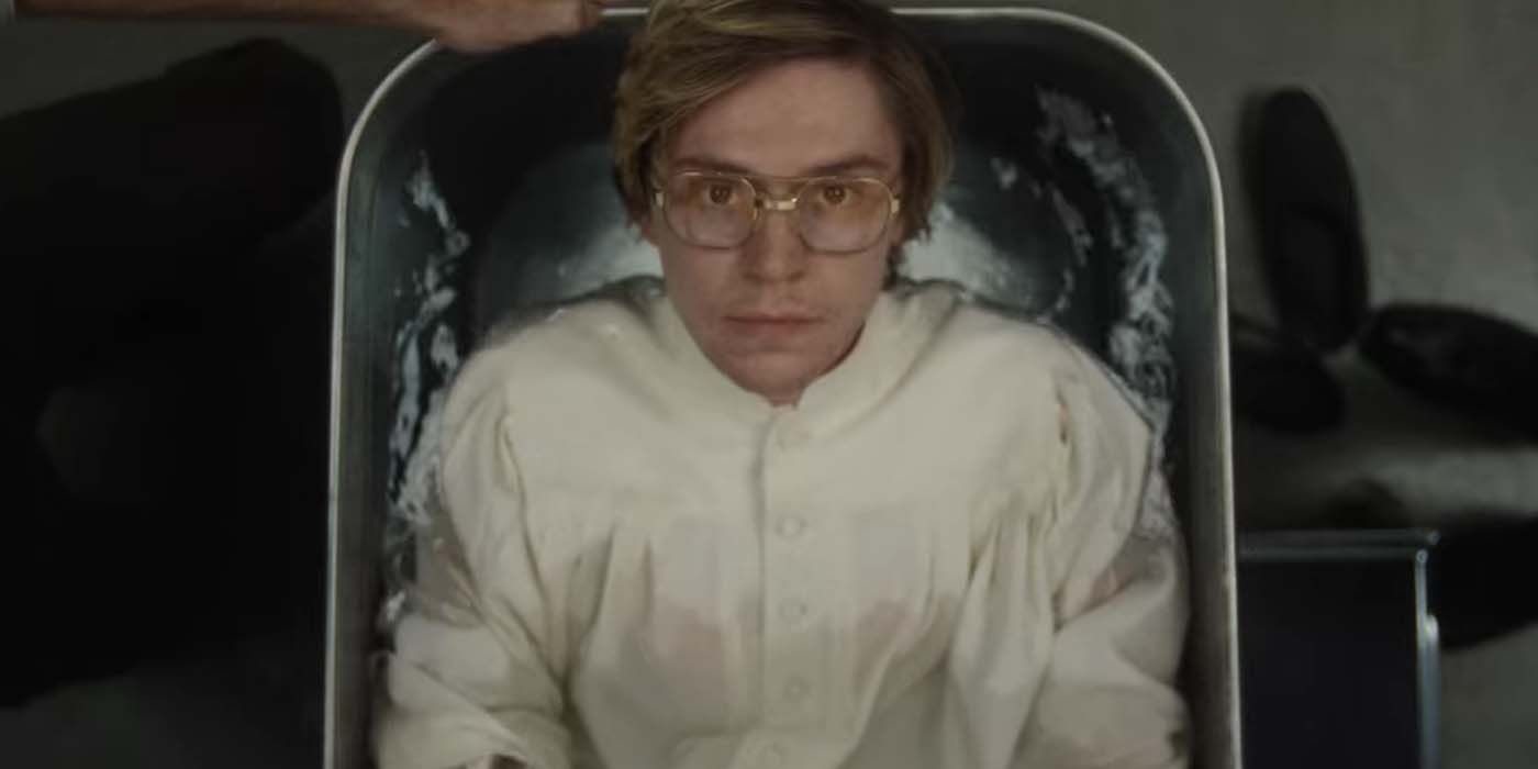 Evan Peters as Jeffrey Dahmer lying in a tub of water in a scene from Monster: The Jeffrey Dahmer Story.