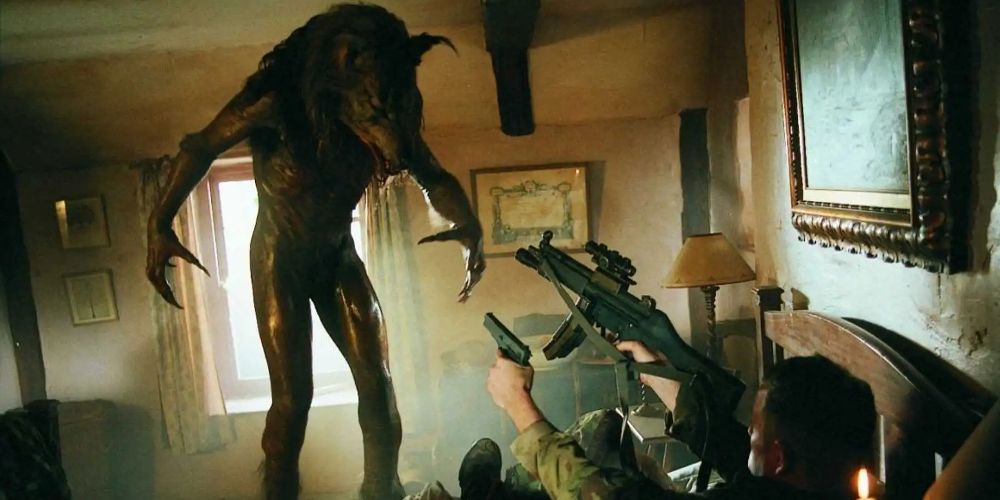 A soldier aims guns at a werewolf in Dog Soldiers