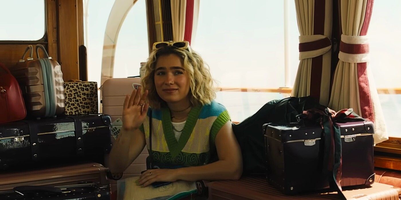 Portia (Haley Lu Richardson) waving awkwardly in The White Lotus