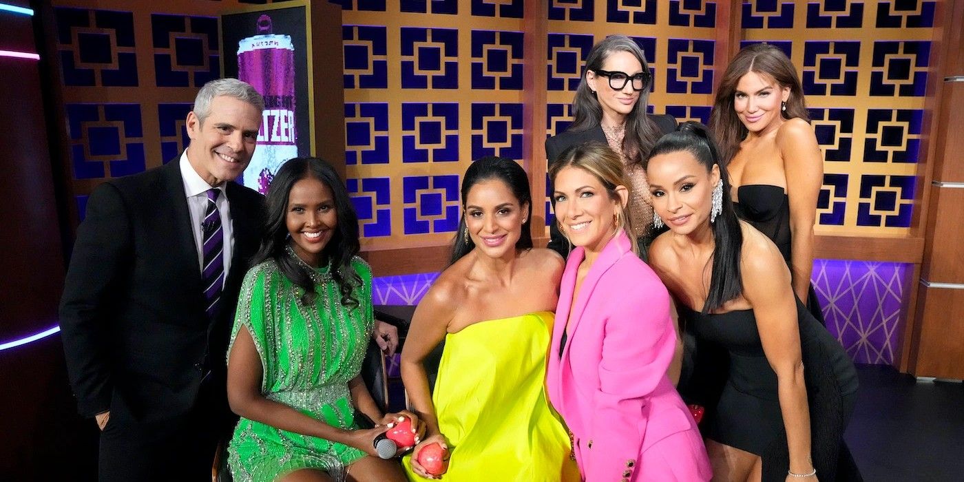 The Real Housewives of New York season 14 cast wearing bright dresses with Andy Cohen