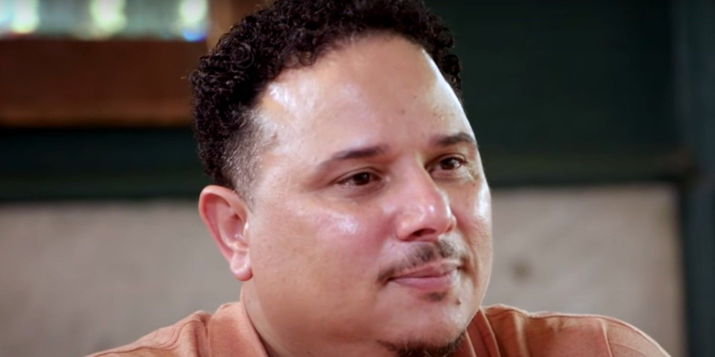 thomas everett smiling in beige shirt talking to cameras The Family Chantel CROPPED