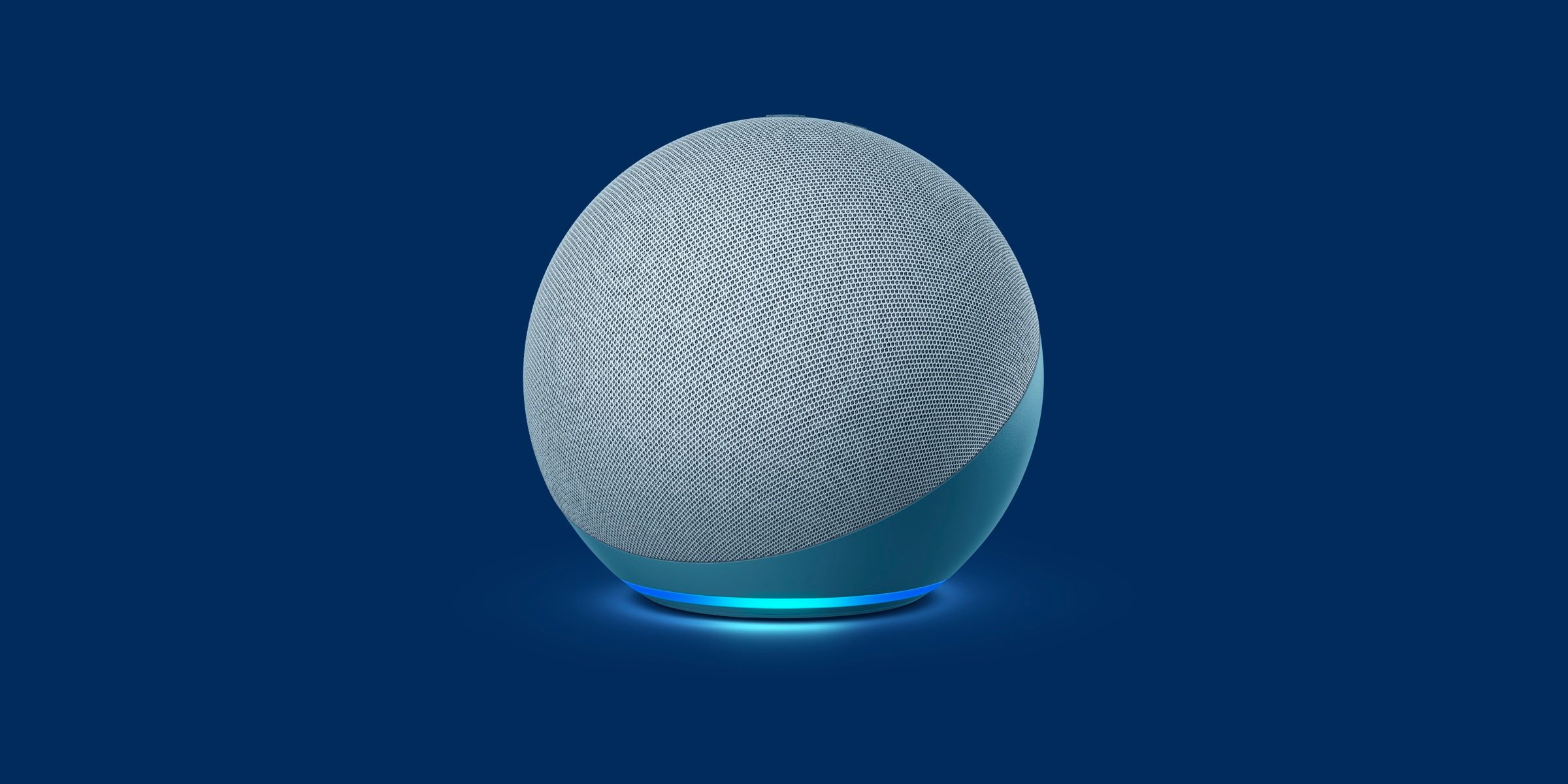 Amazon Echo Dot pictured against a navy blue background