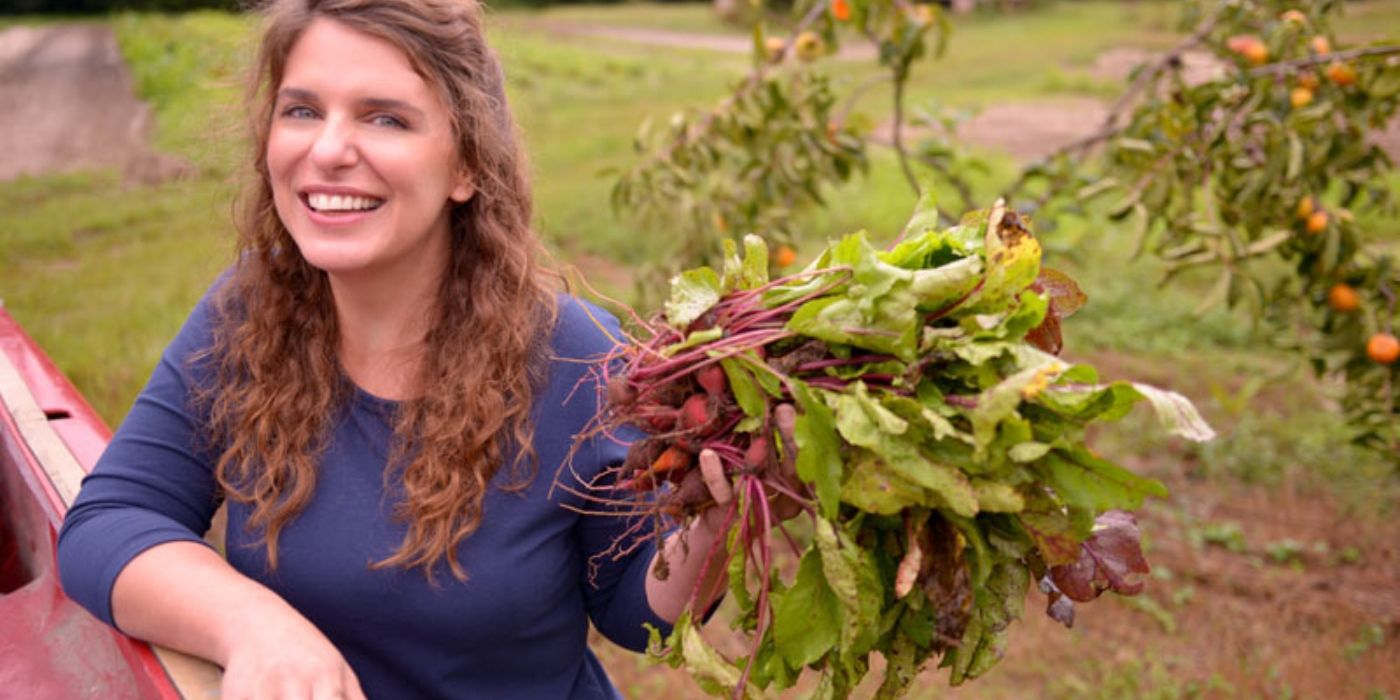 Vivian Howard holding up a bunch of radishes in A Chef's Life