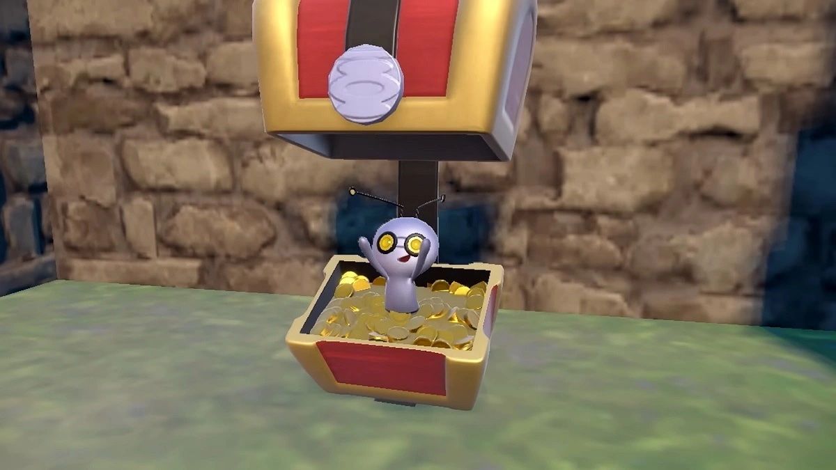 A Gimmighoul Tossing a Coin in Pokémon Scarlet and Violet