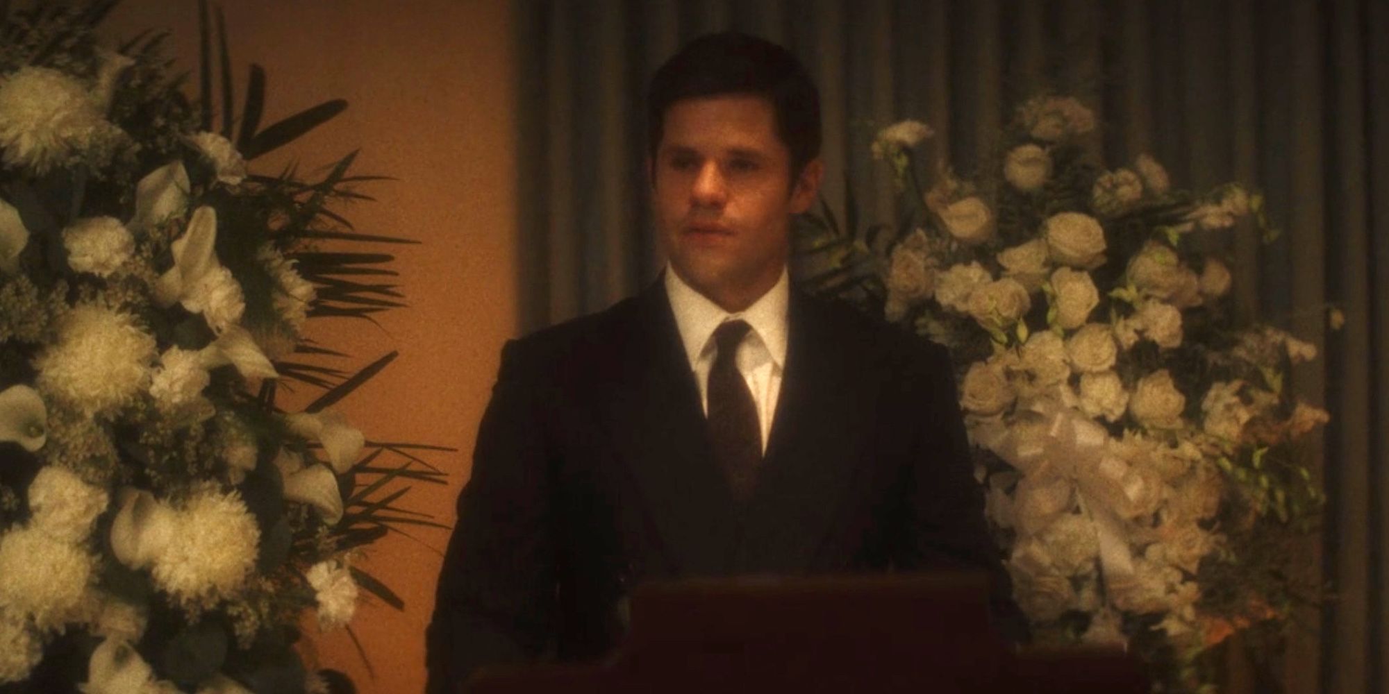 Adam speaks at Gino's funeral in American Horror Story NYC's ending