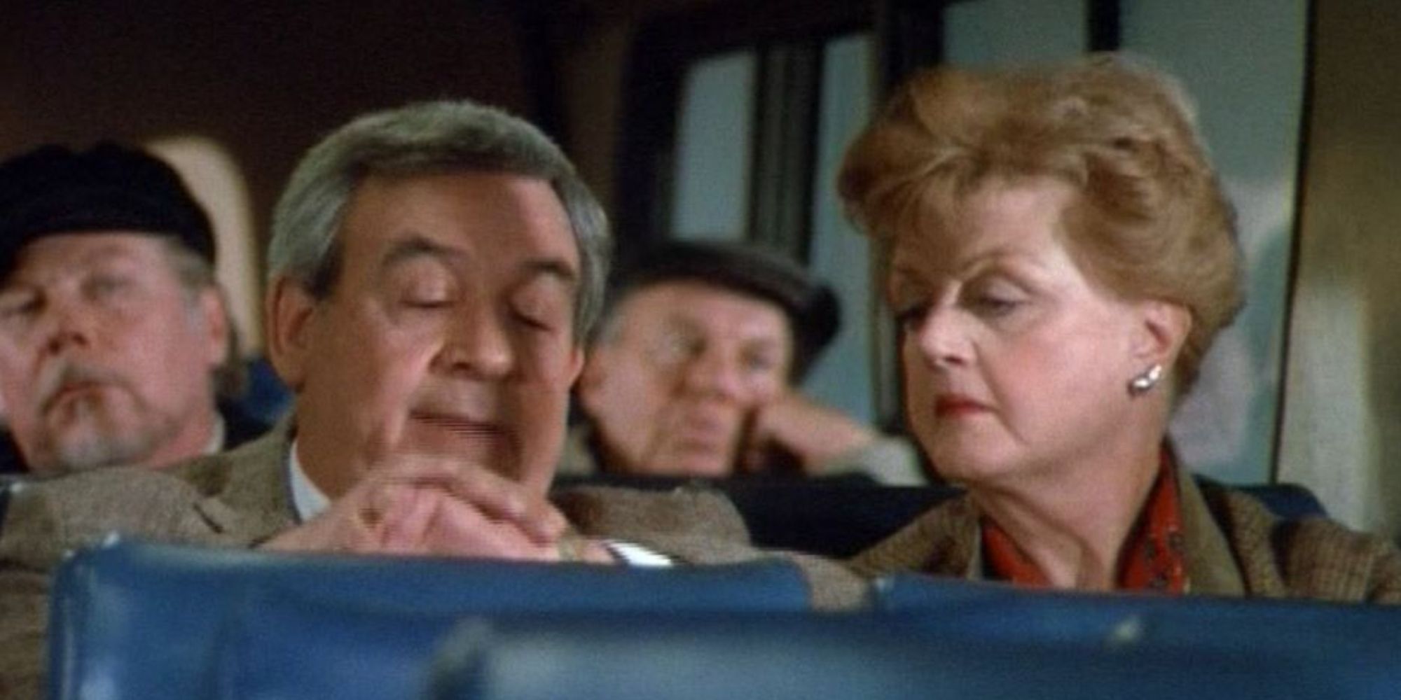 Amos and Jessica sit on the bus together in Murder, She Wrote