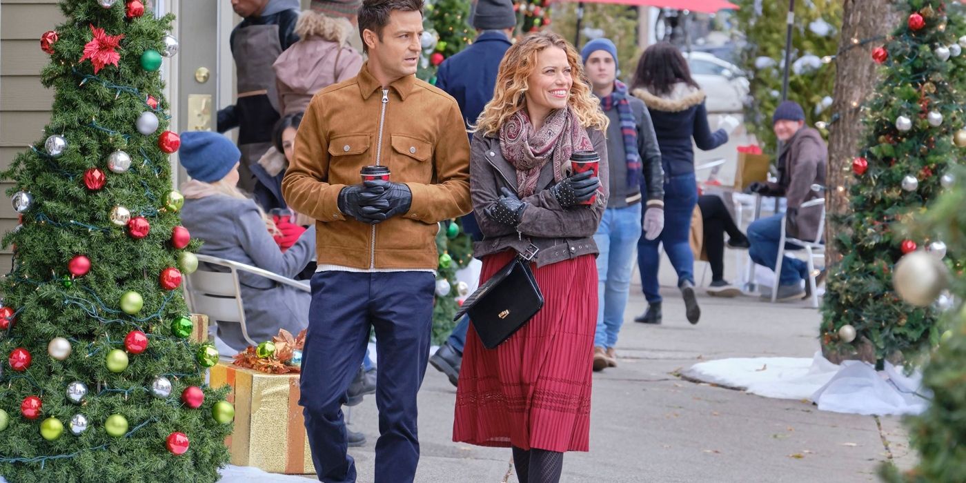 Jamie and Emily walking outside in An Unexpected Christmas