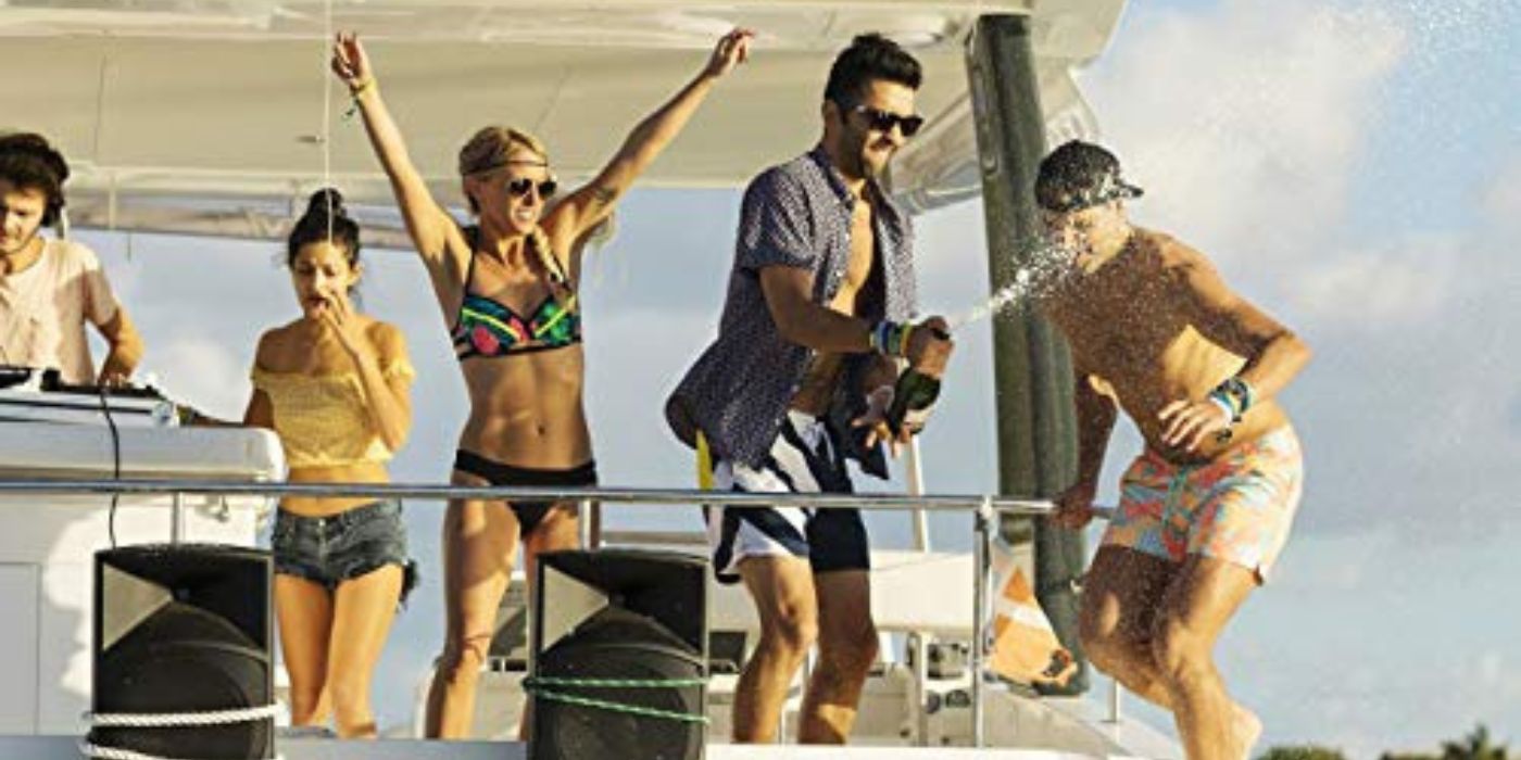 An image of the cast of Unanchored partying on a boat