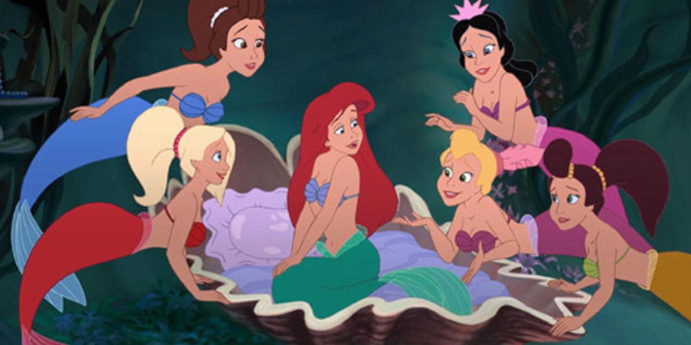 Ariel sitting in a clam shell surrounded by five of her sisters in Ariel's Beginning. 