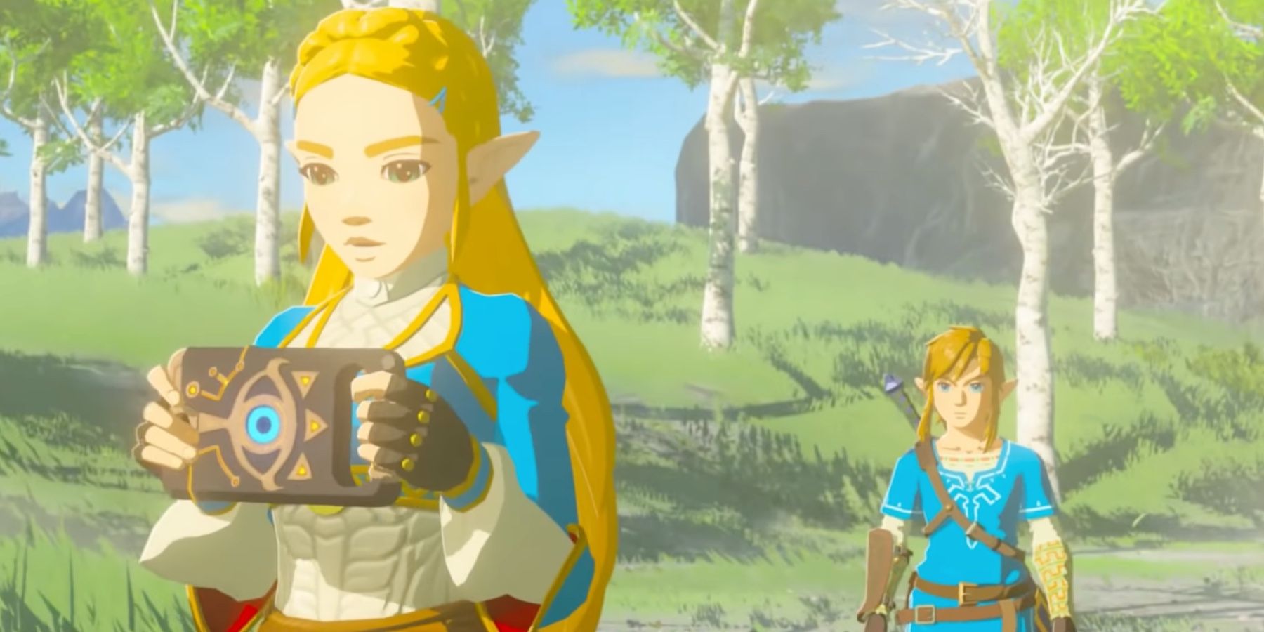 Zelda e Link parados em uma clareira gramada em Breath of the Wild, cercados por pequenas árvores