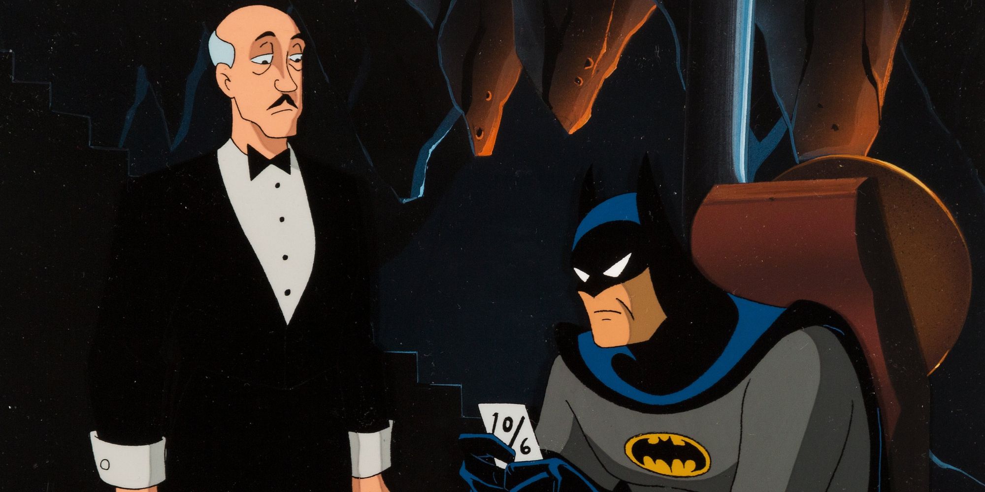 Batman e Alfred investigando uma carta dentro da Batcaverna em Batman The Animated Series