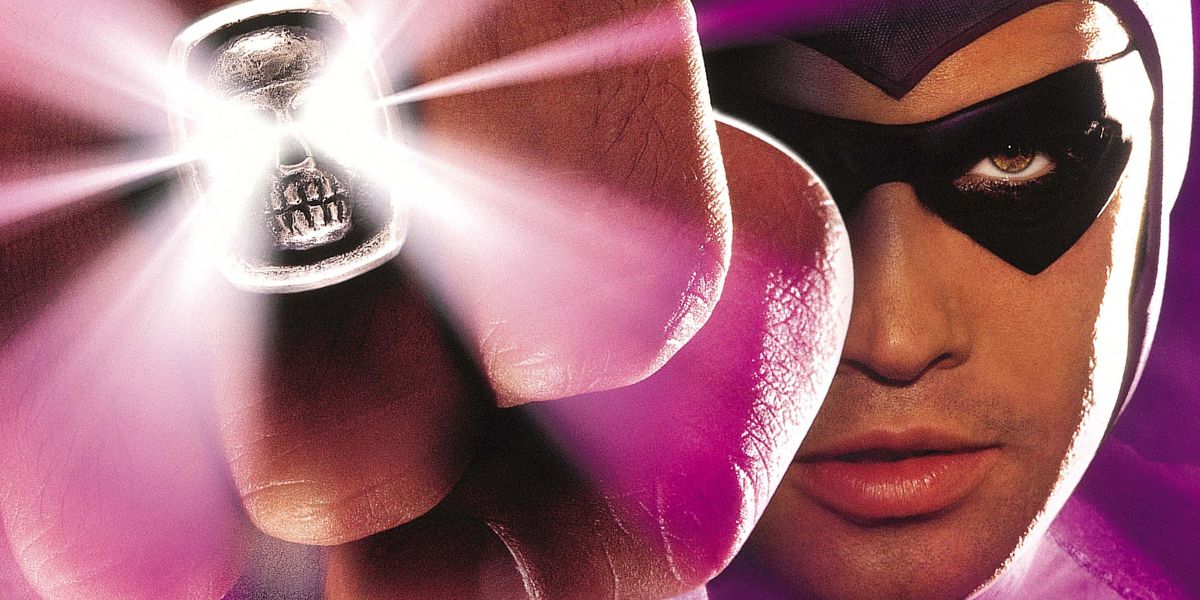 Billy Zane as The Phantom striking while wearing his skull mask and ring