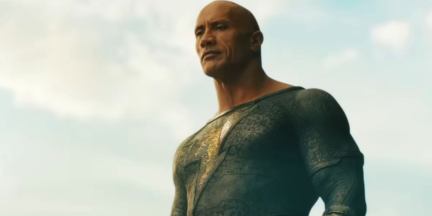 Dwayne Johnson as Black Adam floating triumphantly