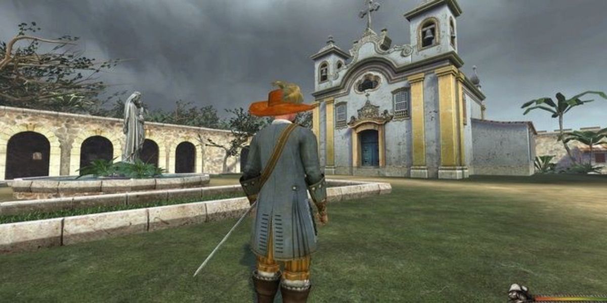 A pirate stands in the yard of a church from Blood and Gold Caribbean!
