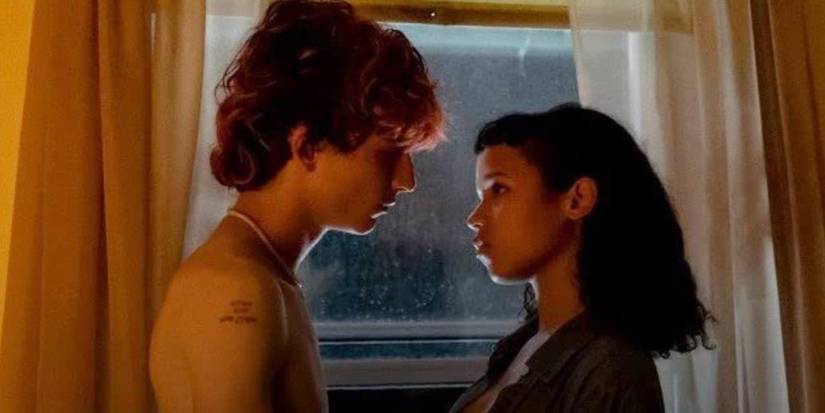 Timothée Chalamet's Lee and Taylor Russell's Maren staring at each other Bones and All 