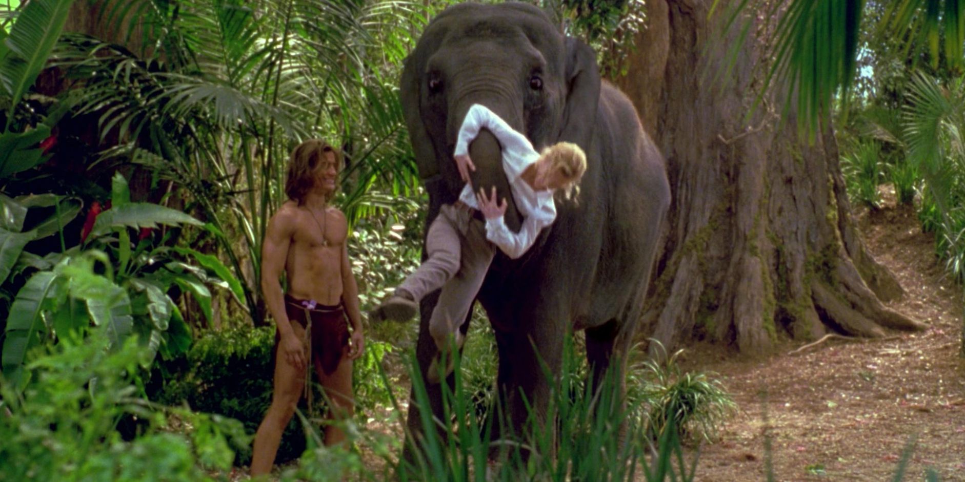 Brendan Fraser, Leslie Mann and an elephant in George of the Jungle
