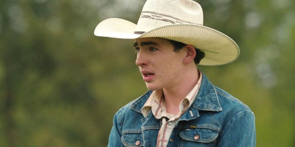 Carter rides a horse in Yellowstone