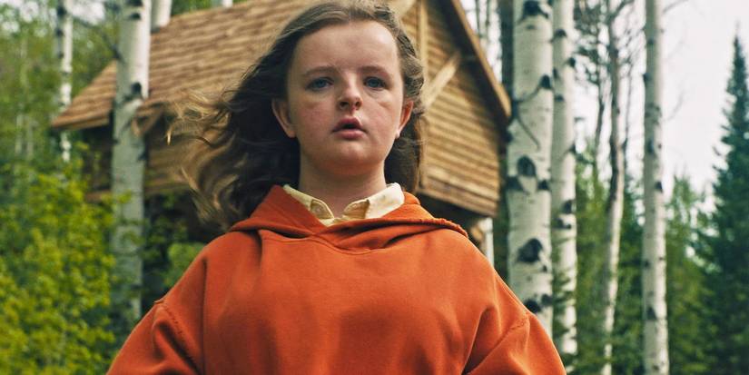 Charlie stands in the backyard in Hereditary